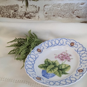 May include: A set of three ceramic mugs with a speckled, matte finish. The mugs are in shades of cream, light gray, and dark gray. Each mug has a simple, minimalist design, perfect for coffee or tea.