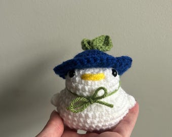 Gehaakt mini-buitje eend met fruithoedje Handgemaakte knuffel Amigurumi-knuffel