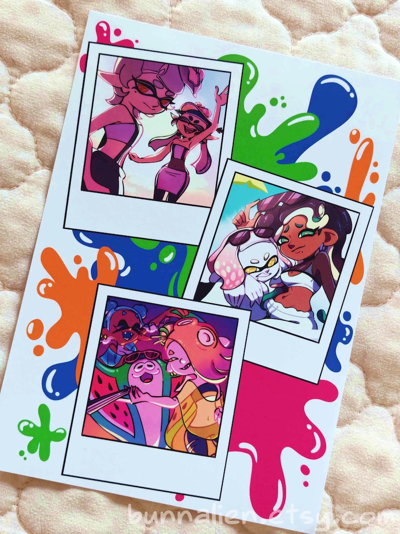 May include: A rectangular art print featuring three polaroid-style illustrations of animated characters with colorful ink splatters in green, blue, orange, and pink. The bottom of the print displays the text bunnalien.etsy.com in white.
