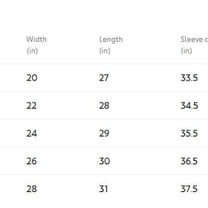 May include: A white table of clothing sizes, including width, length, and sleeve center back measurements in inches. Sizes range from S to 2XL, with corresponding measurements for each size. The table is labeled "Sizing".