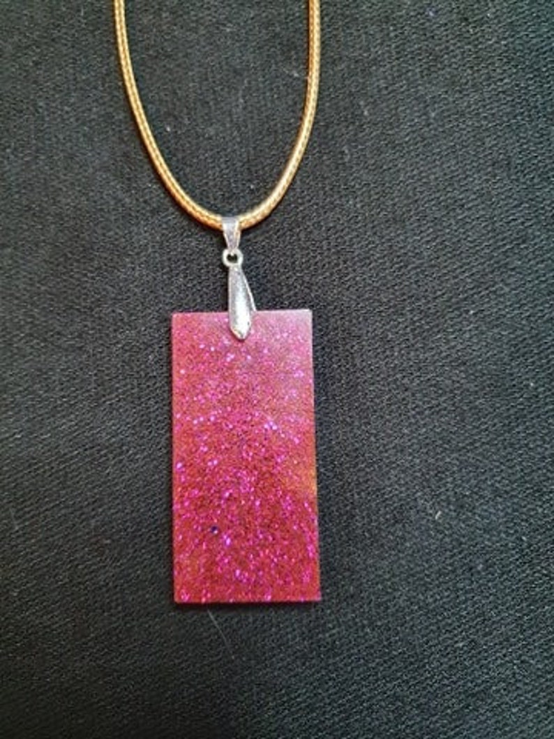 Purplepink glitter pendant with cord necklace