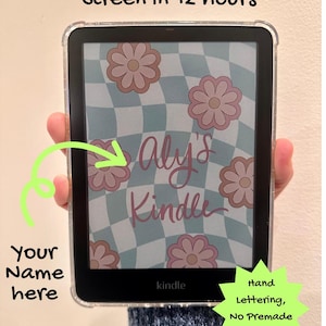 May include: A Kindle e-reader with a custom lock screen featuring a floral design in pink and light blue. The screen displays the text "Aly's Kindle" in a handwritten style. The device is held in a clear protective case. Text on the image reads "Custom Kindle Lock Screen in 12 hours."