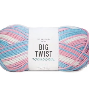 May include: A skein of Big Twist yarn in a blue, pink, and white colorway. The yarn is 100% anti-pilling acrylic and contains 199 yards / 3.85 oz (182 m / 110 g).