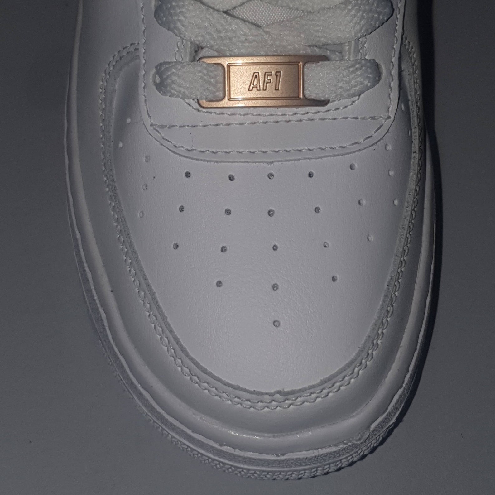 gold air force one lace lock