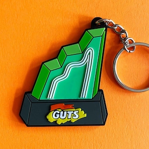 Piece of the Aggro Crag Keychain --  Guts TV Game Show