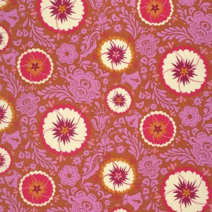 May include: A floral fabric with a repeating pattern of large, stylized flowers in shades of cream, pink, and orange. The flowers have a central starburst design and are set against a background of smaller floral and leaf motifs.
