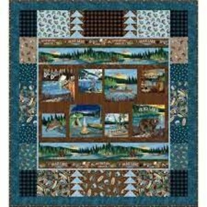 May include: A patchwork quilt with a nature theme. The quilt features images of a lake, trees, and wildlife. The border is a dark teal with a repeating pattern of fish and leaves. The center has a brown background with images of a lake and wildlife.
