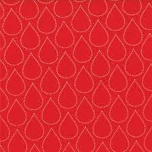 May include: Red fabric with a white repeating pattern of raindrops.