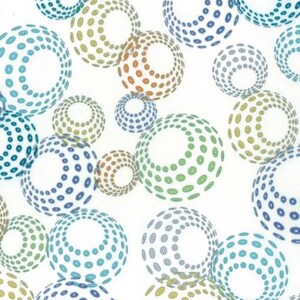 May include: A white fabric featuring a repeating pattern of circular spheres composed of small, colorful dots. The spheres appear in various sizes and shades of blue, green, yellow, and orange, creating a dynamic, abstract, and geometric visual effect.