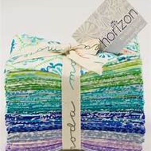 May include: A stack of 20 fabric squares in a variety of blue, green, and purple shades with a white background. The fabric has a variety of patterns, including floral, geometric, and paisley. The fabric is packaged in a white box with a white ribbon and a tag that says "horizon".