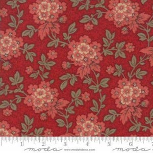 May include: Red floral fabric with a repeating pattern of large, peach-colored flowers and green leaves. The flowers have multiple layers of petals. The fabric has a textured appearance and is suitable for quilting or other craft projects.
