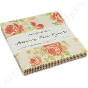 May include: A stack of fabric squares with a floral pattern featuring peach and coral roses on a cream background. The fabric is labeled "moda Strawberry Fields Revisited" by Fig Tree & Co.