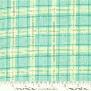 May include: A light blue and white plaid fabric with a subtle green woven pattern.
