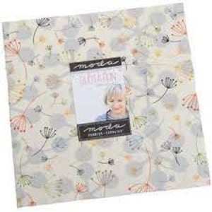 May include: A Moda Fabrics fat quarter bundle featuring a white background with a scattered pattern of colorful dandelion seeds. The bundle includes 12 fat quarters, each measuring 18 inches by 21 inches.