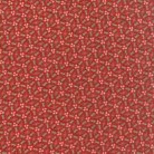 以下が含まれることがあります： 小さなスタイリッシュな花が白で繰り返し描かれた赤い布地