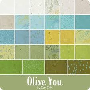 May include: A fabric collection labelled "Olive You" by Zen Chic, presenting an array of square fabric swatches. The swatches showcase patterns in shades of green, blue, and yellow, with designs including dots, leaves, and abstract shapes. The overall theme is nature-inspired.