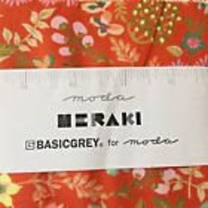 May include: Red fabric with a floral print featuring pink, yellow, and green flowers and leaves. The fabric has the text "meraki" and "BASICGREY for meraki" printed on a white label.
