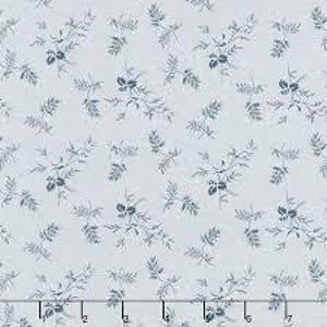 May include: A white fabric with a light blue floral pattern. The pattern features small sprigs of leaves and flowers.