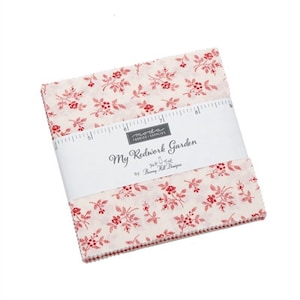 May include: A Moda Fabrics charm pack featuring a white fabric with a red floral pattern. The pack is labeled "My Redwork Garden" by Bunny Hill Designs.