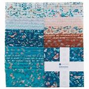 May include: A pack of 42 fabric squares in various shades of blue, green, and pink with floral and geometric patterns. The fabric squares are arranged in a grid pattern and feature a white label with the word "Charm Pack" printed on it.