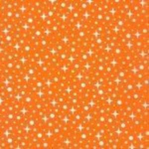 May include: Orange background with a repeating pattern of white stars and white dots.