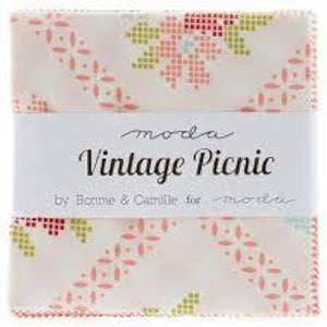 May include: Moda Vintage Picnic fabric charm pack by Bonnie & Camille. The pack features 42 - 2.5 inch squares of pink, green, and blue floral patterned fabric on a white background.