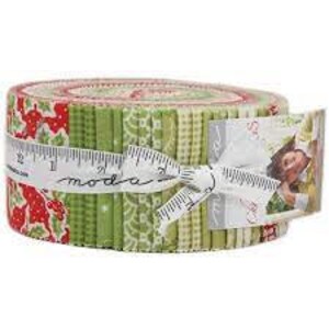 May include: A roll of green and red Christmas fabric featuring a variety of patterns, including holly, snowflakes, and stars. The fabric is wrapped around a cardboard tube and tied with a white ribbon.