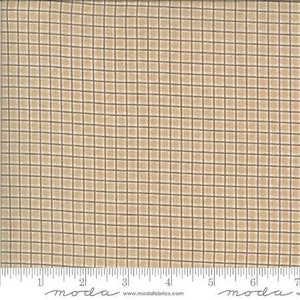 Może przedstawiać: Beżowy materiał z drobnym brązowym wzorem kratki. Materiał jest pokazany z linijką do skalowania.