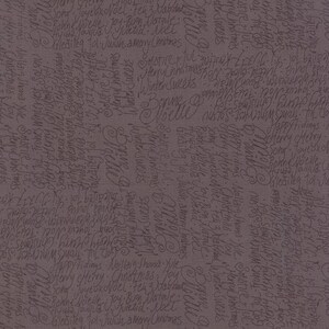May include: A dark grey fabric with a repeating pattern of handwritten words related to the festive season, including "Merry Christmas", "Happy Holidays", "Winter Sweets", and "Solstice".