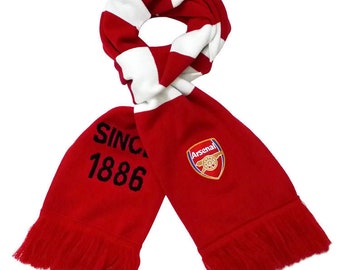 Arsenal Blanket & Scarf Set Includes Pulse Fleece Blanket & Striped Scarf Arsenal Blanket & Scarf Set Includes Pulse Fleece Blanket & Striped Scarf
