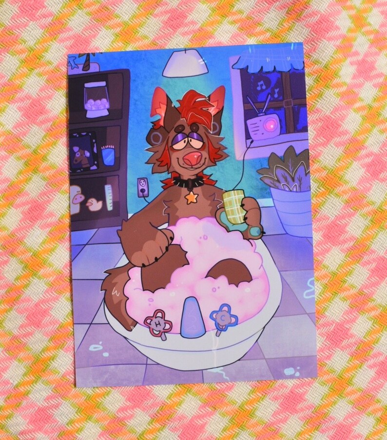 May include: An illustration of a brown anthropomorphic canine character relaxing in a bathtub filled with pink bubbles. The character has red hair and is holding a green and white checkered cup. The bathroom has a blue color scheme.
