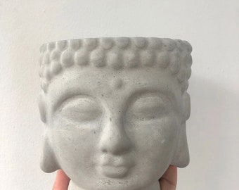 Concrete Buddha head planter