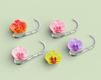 Colgador de bolso de orquídea hecho a mano con bolsita de terciopelo • Gancho plegable para bolso de mesa • Soporte para bolso de flores de arcilla polimérica • San Valentín y Día de la Madre