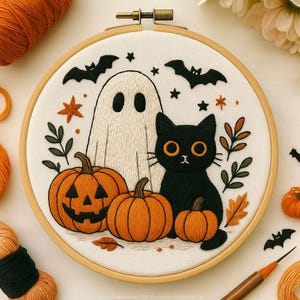 May include: Embroidered Halloween hoop art featuring a ghost, black cat, and pumpkins. The design includes bats, stars, and fall foliage. The pumpkins are orange, and the cat has orange eyes. The embroidery is set in a wooden hoop.
