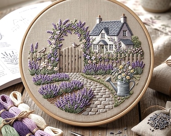 May include: A detailed embroidery hoop art piece featuring a cottage scene with a lavender garden. The design includes a house, a picket fence, a stone path, and a watering can. The color palette includes shades of purple, green, and beige.