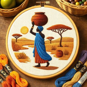May include: Embroidered hoop art featuring a woman carrying a water jug on her head, set against a desert landscape with trees and a sun. The woman wears a blue shawl and orange dress. Embroidery floss in orange, yellow, and blue are in the foreground.