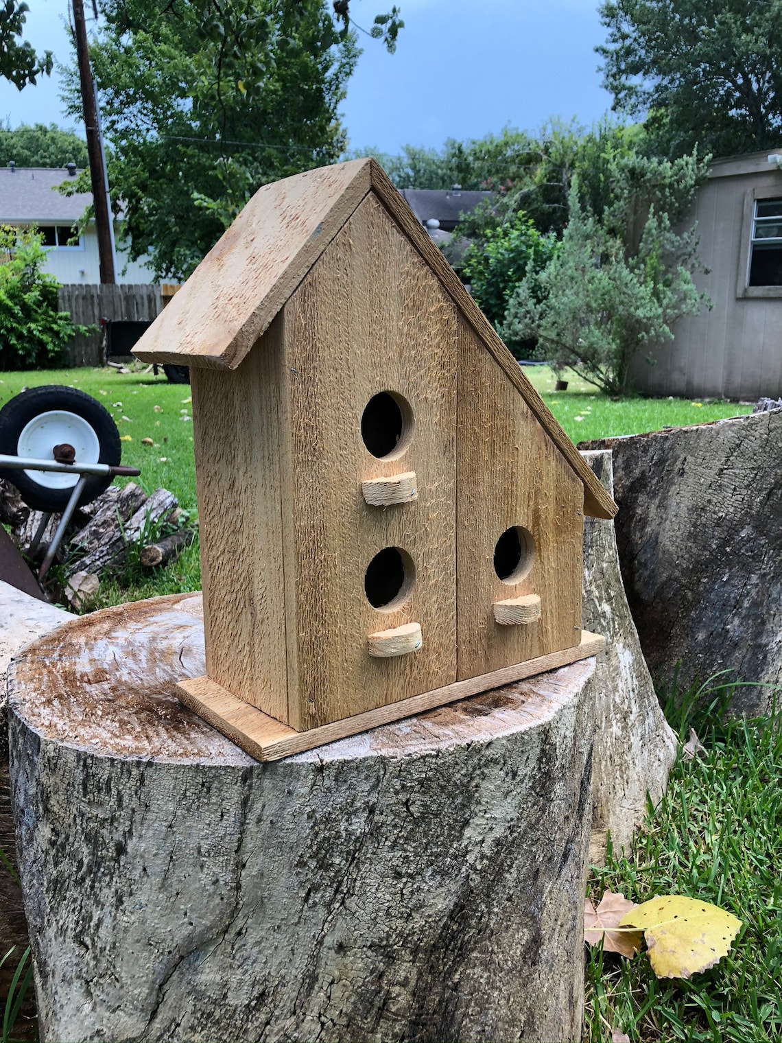 Two story handmade birdhouse. Made of cedar with a natural Etsy