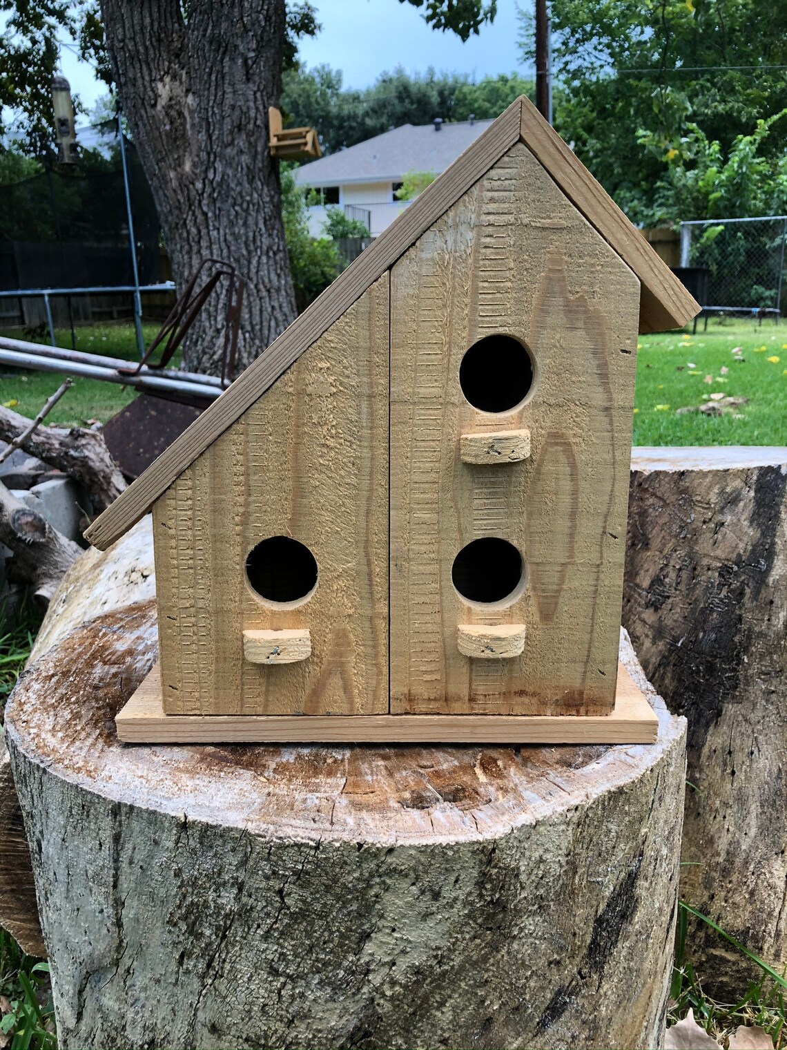 Two story handmade birdhouse. Made of cedar with a natural Etsy