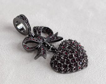 Vintage Joan Rivers Heart Bow Pendant: Black Metal Red Crystals