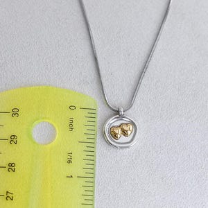 Collana con ciondolo a forma di cuore color oro Brighton: gioielli delicati incisi immagine 3