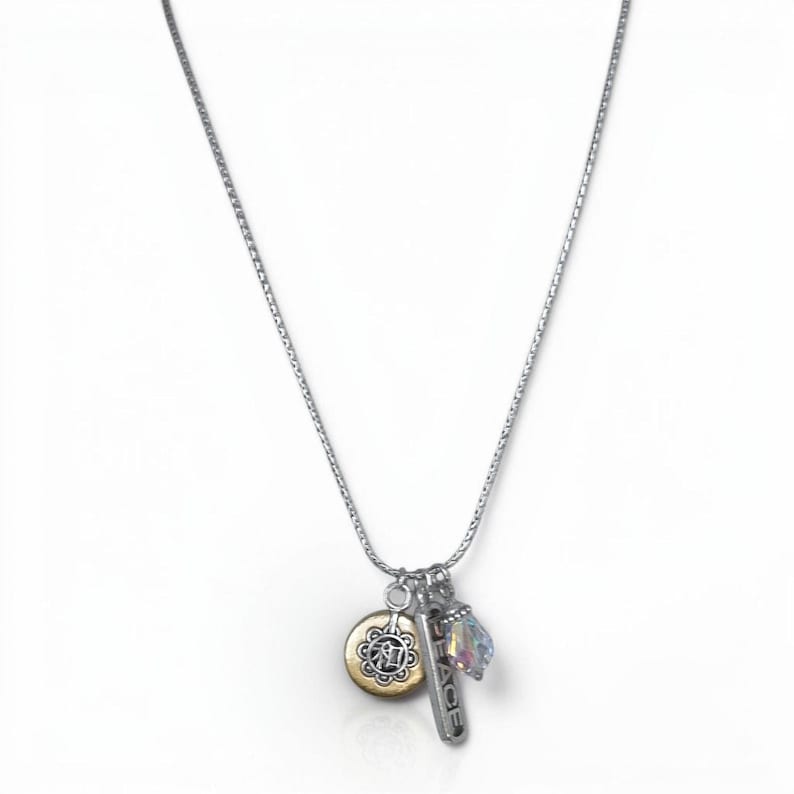 Collana vintage Brighton con ciondolo a forma di simbolo cinese della pace, bicolore oro e argento immagine 2