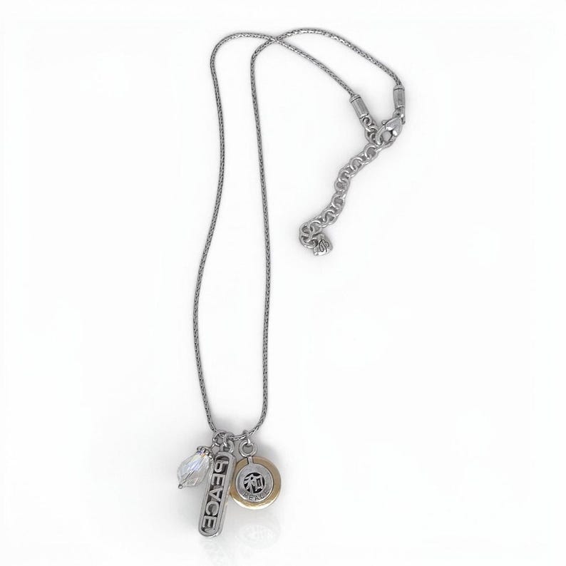 Collana vintage Brighton con ciondolo a forma di simbolo cinese della pace, bicolore oro e argento immagine 3