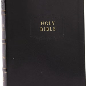 May include: A black leather-bound Holy Bible with gold lettering and a gold ribbon bookmark.