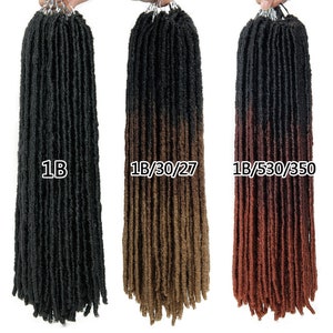 May include: Three bundles of synthetic dreadlocks in different colors. The first bundle is black, labeled "1B". The second bundle is ombre, with black at the top and brown at the bottom, labeled "1B/30/27". The third bundle is ombre, with black at the top and red at the bottom, labeled "1B/530/350".