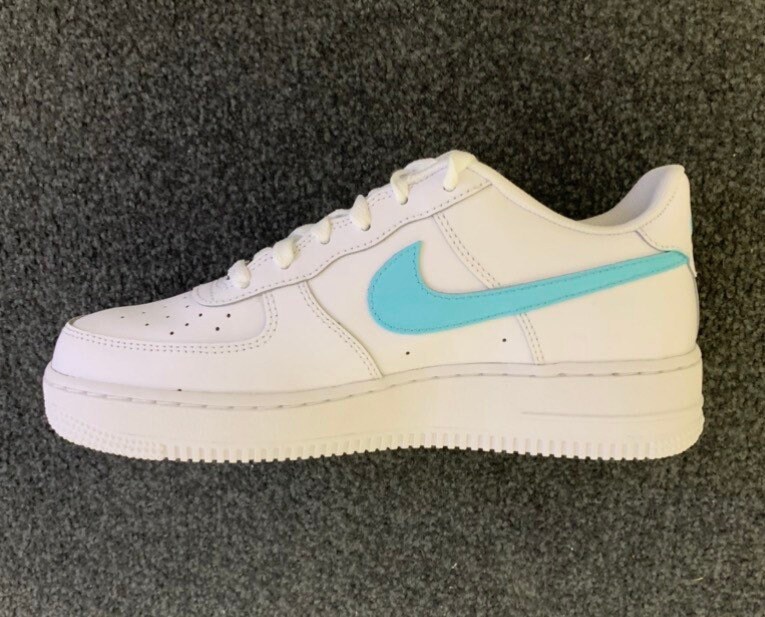 black air forces with blue tick