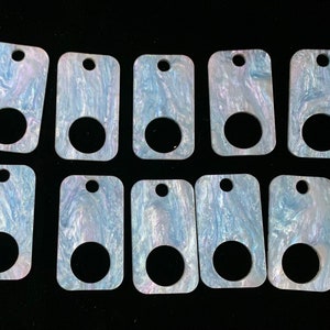 Rectangular Unicorn Starry Sky acrylic thread drops. A Crossed In Stitches exclusive.