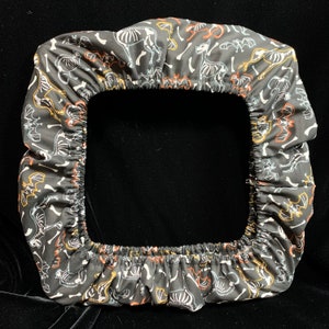 Glow in the dark Halloween fabric grime guard with animal skeletons