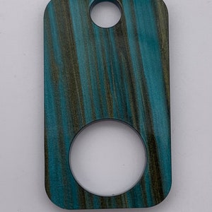 Rectangular brushed turquoise acrylic thread drops.