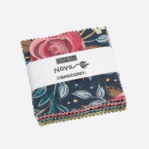 May include: A pack of 10 fat quarter fabric squares featuring a floral pattern with pink, red, blue, green, and yellow flowers on a dark blue background. The fabric squares are labeled "Nova" and "BasicGrey".