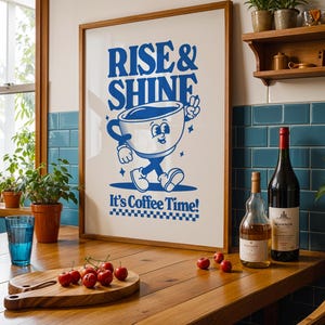 May include: A framed poster with a blue cartoon coffee cup character walking and holding a peace sign. The poster says "Rise & Shine" and "It's Coffee Time!"